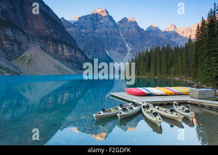 Canoes at Moraine Lake in the Valley of the Ten Peaks, Banff National Park, Alberta, Canada Stock Photo