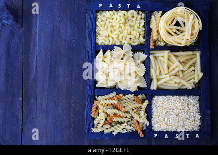 Assorted pasta in a wooden box Stock Photo