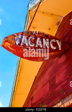 Old worn overhead Vacancy sign at an abandoned motel in Tucumcari on Route 66 in New Mexico Stock Photo