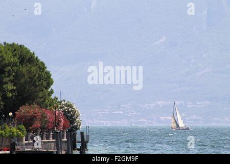 sailing boat on lake Garda in northern Italy Stock Photo