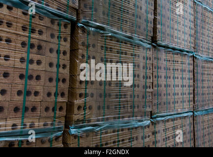 Stacks of packaged bricks Stock Photo