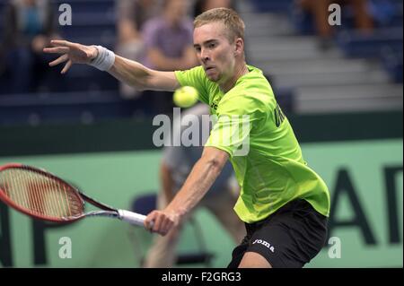 Vilnius, Lithuania. 18th Sep, 2015. Vladyslav Manafov of Ukraine returns the ball to Ricardas Berankis of Lithuania during the first round match of the Davis Cup Group I Europe/Africa Zone play-off between Lithuania and Ukraine in Vilnius, Lithuania, Sept. 18, 2015. © Alfredas Pliadis/Xinhua/Alamy Live News Stock Photo