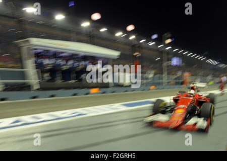 Singapore. 18th Sep, 2015. Team Ferrari driver Sebastian Vettel drives in the second practice during F1 Singapore Grand Prix Night Race in Singapore's Marina Bay Street Circuit, Sept. 18, 2015. © Then Chih Wey/Xinhua/Alamy Live News Stock Photo