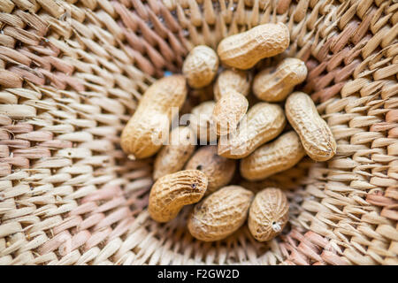 Peanuts in a handwoven bowl in Botswana, Africa Stock Photo