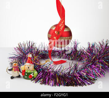 Christmas bauble and decorations with tinsel isolated on white Stock Photo