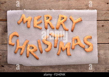 Sweet Merry Christmas background on an old wood plank Stock Photo