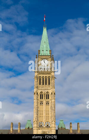 Closeup to the Ottawa Parliament Clock Tower in Canada during the day Stock Photo