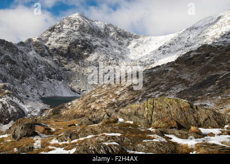 View of the snow covered summit of Snowdon in Snowdonia National Park, Wales, UK from the Pyg track. Stock Photo