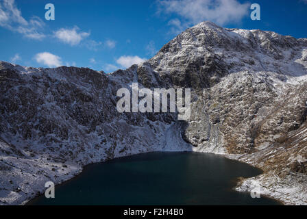View of the snow covered summit of Snowdon in Snowdonia National Park, Wales, UK from the Pyg track. Stock Photo