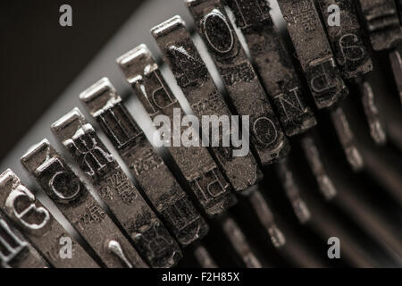 Metal letters on typewriter. Close up macro Stock Photo