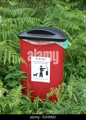 Dog waste bin in countryside UK Stock Photo