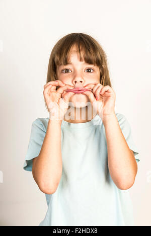 Little Myanmarese Kayan Lahwi girl with tribal brass neck rings