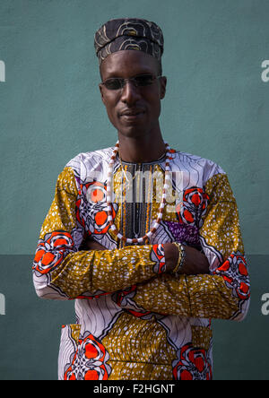 Benin, West Africa, Ganvié, fashionable blind young man with arms crossed Stock Photo