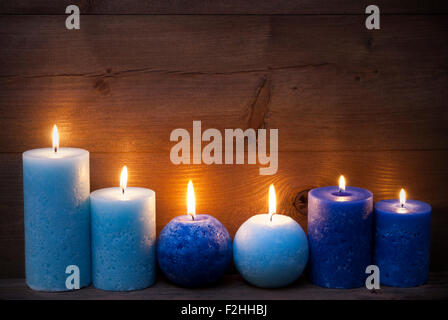 Christmas Decoration With Blue Candles Stock Photo