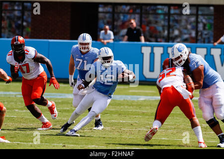 Chapel Hill, NC, USA. 19th Sep, 2015. Marquise Williams (12) of the North Carolina Tar Heels cuts out on the quarterback keeper in the NCAA football matchup between the Fighting Illini of Illinois and the North Carolina Tarheels at Kenan Memorial Stadium in Chapel Hill, NC. Scott Kinser/CSM/Alamy Live News Stock Photo