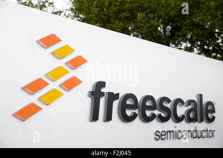 A logo sign outside of the headquarters of Freescale Semiconductor Inc ...