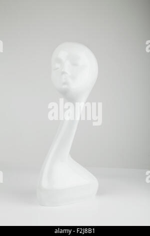 plastic mannequin head on the table Stock Photo
