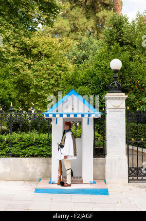 Greek Evzone guards a gate of The Presidential Mansion in Athens, Greece Stock Photo