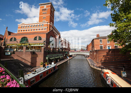 The bridge over the canal at Brindley Place looking towards the NIA in Birmingham, England Stock Photo