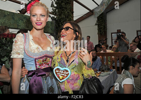 Munich, Germany. 20th Sep, 2015. German model Franziska Knuppe (L) poses with Italian actress Maike Rivelli at the traditional celebrity gathering of Birgitt Wolff in a beer tent at the 182nd Oktoberfest in Munich, Germany, 20 September 2015. The world's largest beer festival which will run until 04 October 2015 is expected to attract some six million visitors from all over the world this year. Photo: URSULA DUEREN/dpa/Alamy Live News Stock Photo