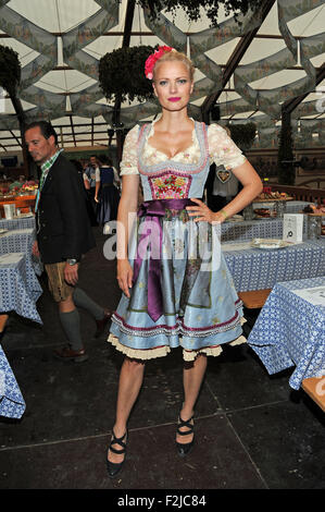 Munich, Germany. 20th Sep, 2015. German model Franziska Knuppe poses at the traditional celebrity gathering of Birgitt Wolff in a beer tent at the 182nd Oktoberfest in Munich, Germany, 20 September 2015. The world's largest beer festival which will run until 04 October 2015 is expected to attract some six million visitors from all over the world this year. Photo: URSULA DUEREN/dpa/Alamy Live News Stock Photo