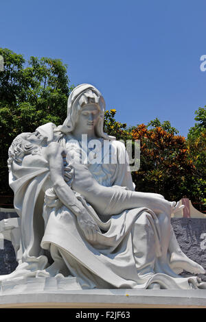 The Pietà is a subject in Christian art depicting the Virgin Mary cradling the dead body of Jesus. Stock Photo