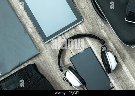 Informal male outfit with electronics, background Stock Photo