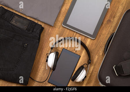 Informal male outfit with electronics, background Stock Photo