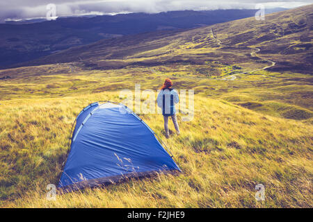 Young woman wild camping