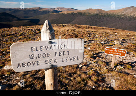 Elevation Sign 12,005 Feet - Alpine Tundra Ecosystem - Rocky Mountain National Park, near Estes Park, Colorado, USA Stock Photo