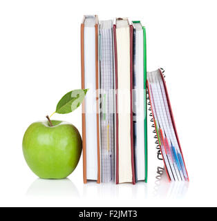 School and office supplies. Notepads and apple. Isolated on white background Stock Photo