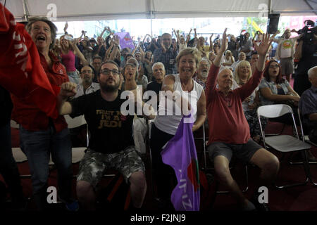 Athens, Greece. 20th Sep, 2015. Supporters of left-wing SYRIZA party react as they watch the first exit polls in Athens, Greece, Sept. 20, 2015. Greek radical left SYRIZA party leads Sunday's general elections, according to an exit poll released with the closing of ballots. Credit:  Marios Lolos/Xinhua/Alamy Live News Stock Photo