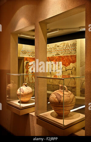 Ancient ceramics & fresco from the archaeological site of Akrotiri, (Santorini) in the National Archaeological Museum of Athens. Stock Photo