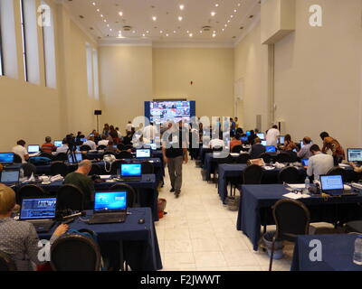 Athens, Greece. 20th Sep, 2015. Press representatives see the first exit polls for the general elections on the Press center. Credit:  George Panagakis/Pacific Press/Alamy Live News Stock Photo