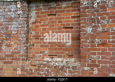 Bricked up space in old red brick wall Stock Photo
