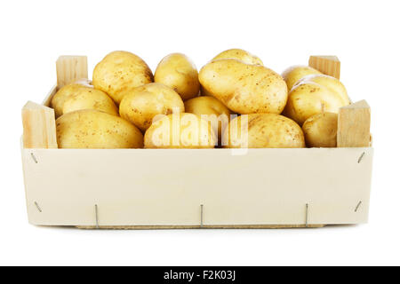 Potatoes in wooden box isolated on white background Stock Photo