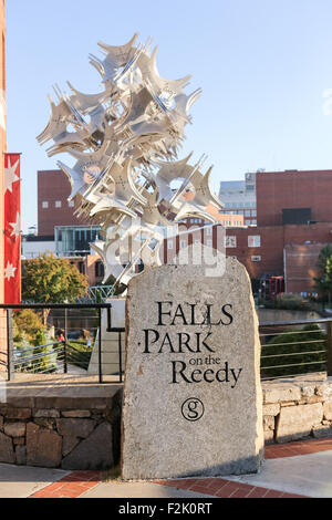 Falls Park on the Reedy River entrance at Art Crossing and 10 Artispheres sculpture along Main Street in downtown Greenville, South Carolina. Stock Photo