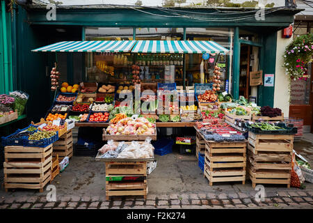 Fruit and vegetable shop front, a greengrocer, in Monmouth, Wales. Stock Photo