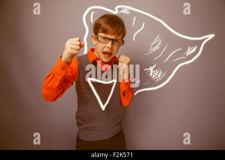 European-looking boy of ten years in glasses, anger, opened his Stock Photo
