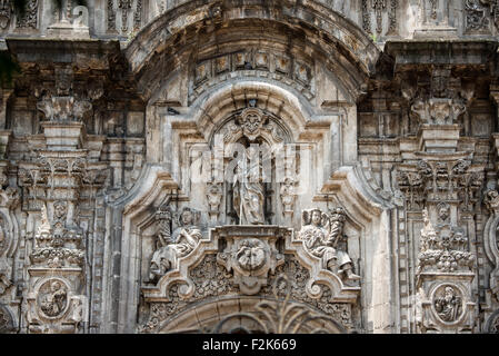 The southern facade of the Metropolitan Tabernacle features ornate depictions of the Eucharist with images of the Apostles, Church Fathers, saints who founded religious orders, martyrs as well as scenes from the Bible. Adjacent to the Metropolitan Catheral, facing the Zocalo, the Metropolitan Tabernacle (Spanish: Sagrario Metropolitana) was built by Lorenzo Rodríguez in the Baroque style between 1749 and 1760. It was designed to to house the archives and vestments of the archbishop. It also functioned and continues to function as a place to receive Eucharist and register parishioners. Stock Photo