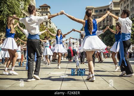 Barcelona, Catalonia, Spain. 20th Sep, 2015. Dancers take part in the 65th edition of the 'Sardanes groups' competition dancing a 'long sardana' during Barcelona's city festival, 'La Merce' 2015. The 'sardana' is a type of circle dance typical of the Catalan culture and a national symbol. Credit:  Matthias Oesterle/ZUMA Wire/Alamy Live News Stock Photo