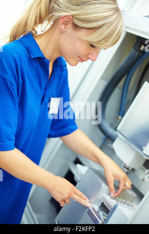 Dental technician working on a CAD CAM Stock Photo