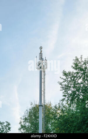 Antennas on the tower base station of cellular network. Stock Photo