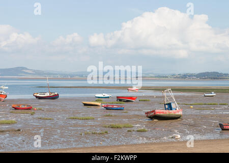 A sunny September day in Morecambe, walking along the coast looking at the sea and boats with the tide out Stock Photo