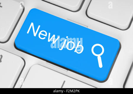 Blue new job button on white keyboard Stock Photo