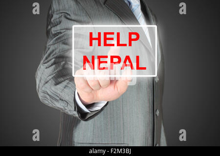 Businessman pushing virtual help Nepal button on black background Stock Photo