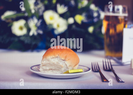 Bread on plate at wedding reception Stock Photo