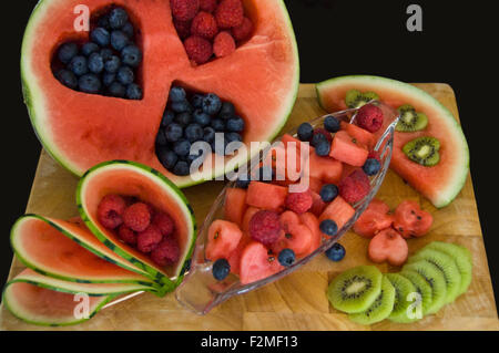 Horizontal close up of a fruit salad cut into various heart shapes. Stock Photo