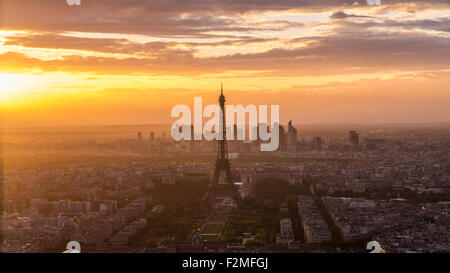 Elevated view of the Eiffel Tower, city skyline and La Defence skyscrapper district in the distance, Paris, France, Europe