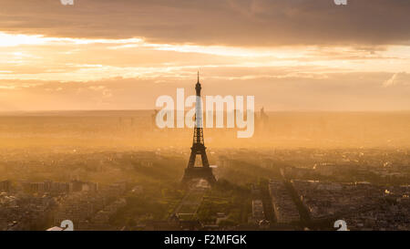 Elevated view of the Eiffel Tower, city skyline and La Defence skyscrapper district in the distance, Paris, France, Europe